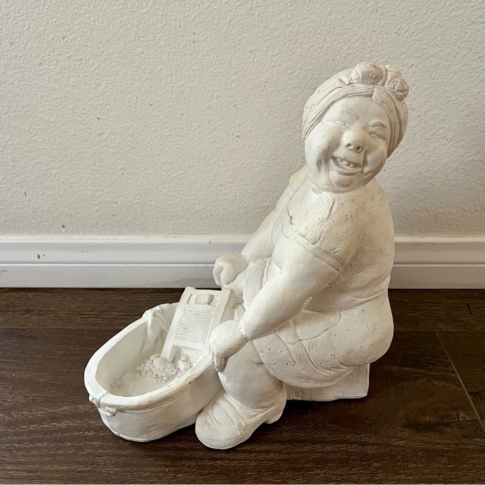 Charming White Sculpture of a Smiling woman